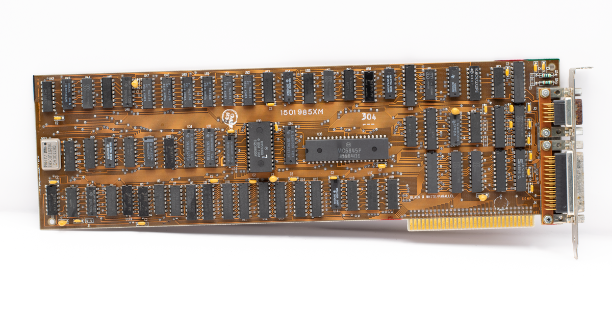 Detailed image of a vintage computer circuit board showcasing its intricate pathways and components.