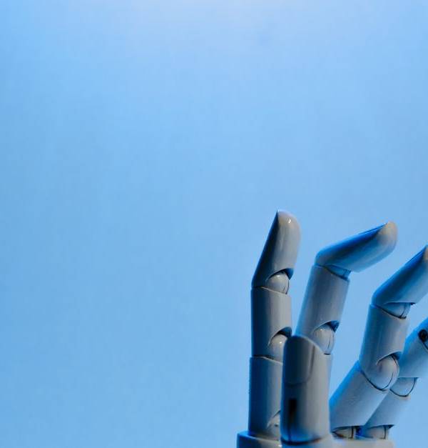 Robotic hand with articulated fingers reaching towards the sky on a blue background.