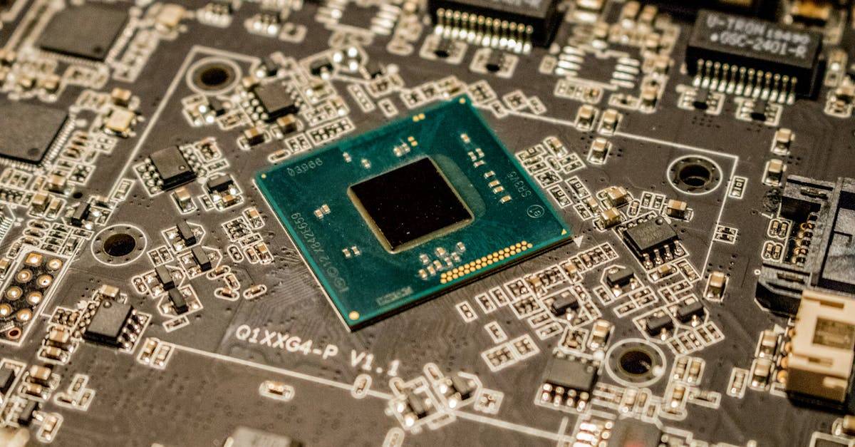 Detailed view of a microchip on a printed circuit board, showcasing electronic components.