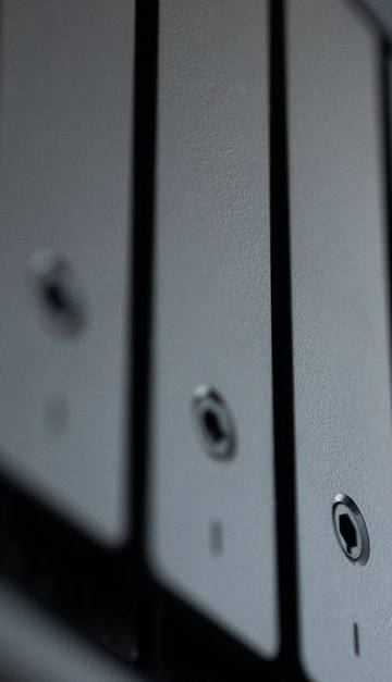 Detailed view of a black data storage unit highlighting modern technology and data management.