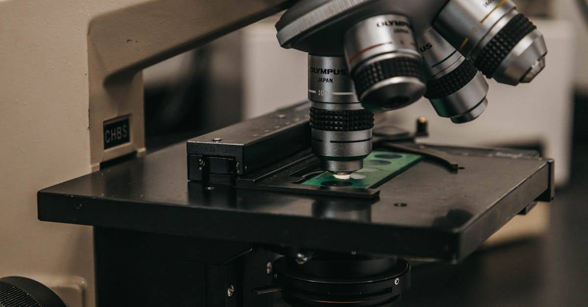 Detailed view of a laboratory microscope, essential for scientific research and analysis.