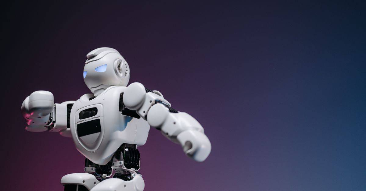 Close-up of a futuristic robotic toy against a gradient background, symbolizing innovation and technology.