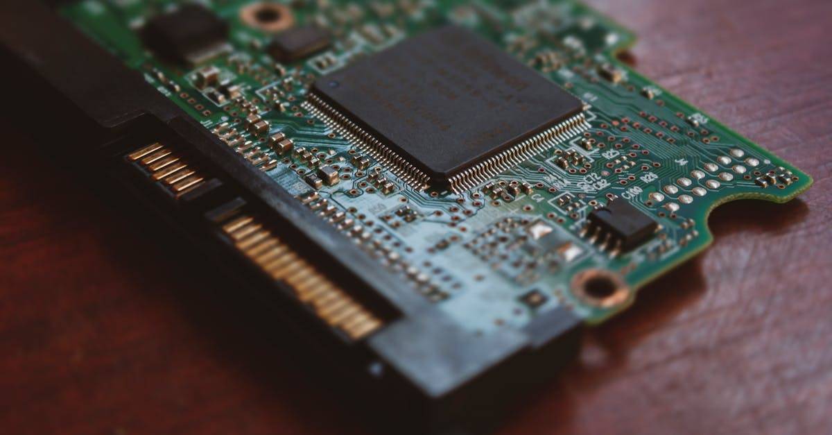 Detailed shot of a computer circuit board showing components and golden pins.