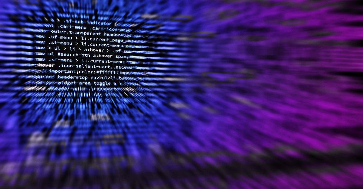 Dynamic abstract background featuring computer code in focus with blurred effect.