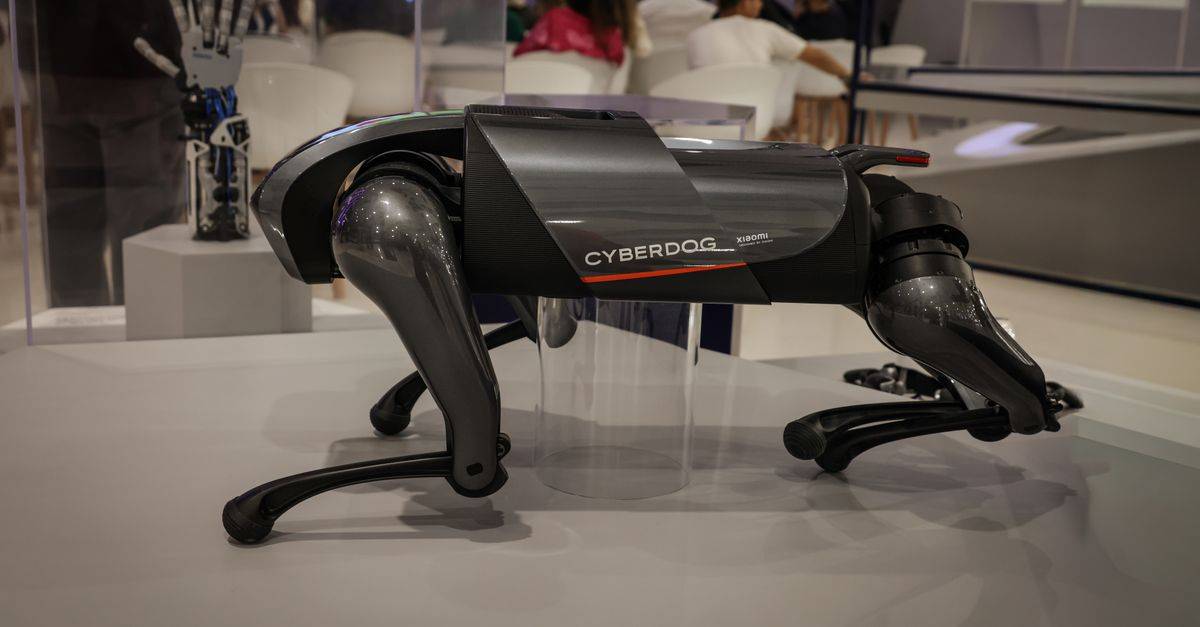 A futuristic robot dog, the Cyberdog, on display in an indoor setting, showcasing advanced robotics technology.