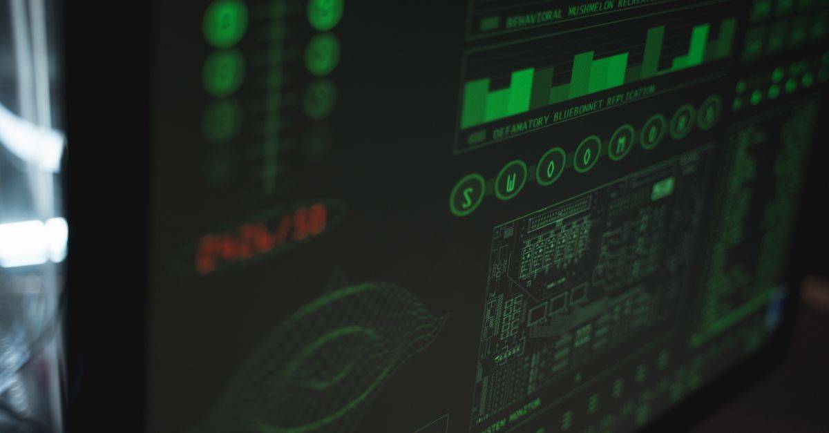 Close-up view of a computer displaying cybersecurity and data protection interfaces in green tones.