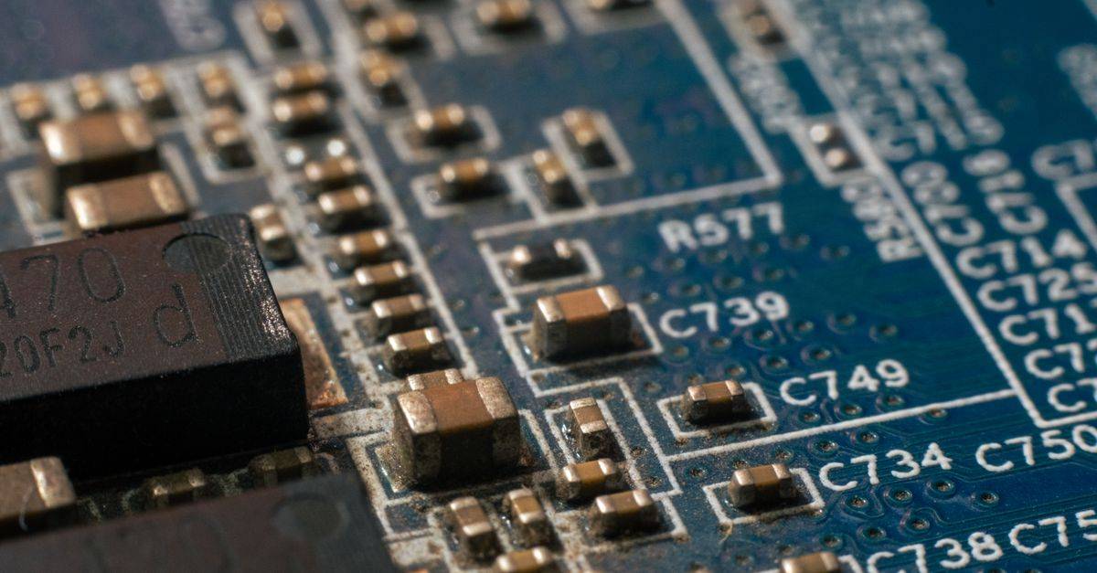 Detailed macro shot of a circuit board highlighting electronic components and traces.