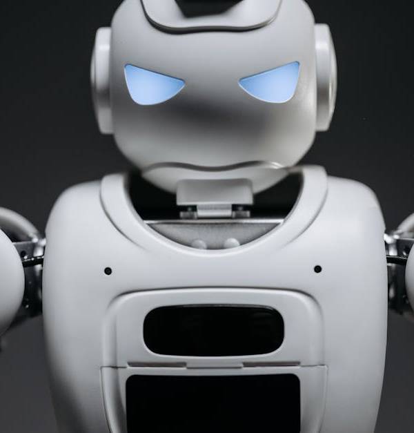 Detailed studio shot of a modern robotic toy with a dark background, showcasing technological design.