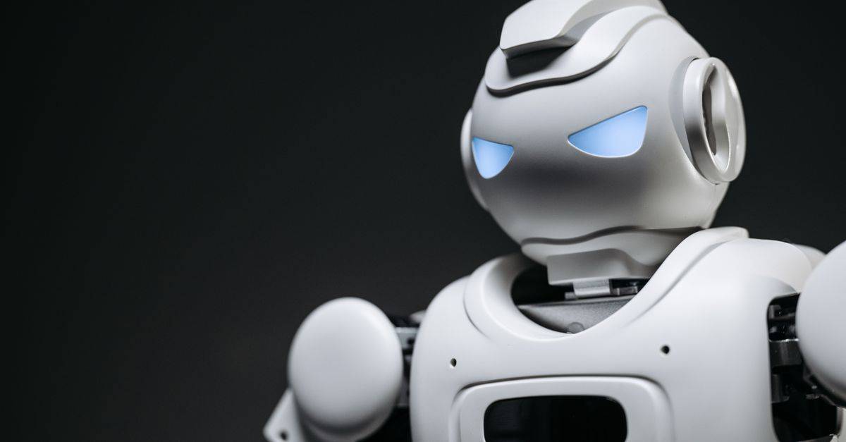 High-tech robot toy with a gray background in studio lighting.