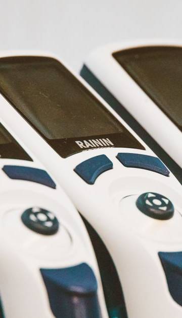 Close-up of medical devices lined in a row, showcasing technology and design.