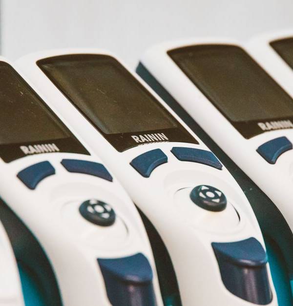 Close-up of medical devices lined in a row, showcasing technology and design.