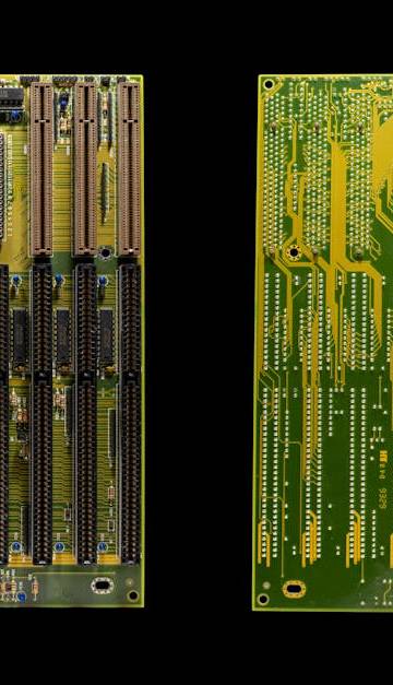 Detailed image of a vintage motherboard featuring an Intel 486 chip, showcasing the complexity of retro computing components.
