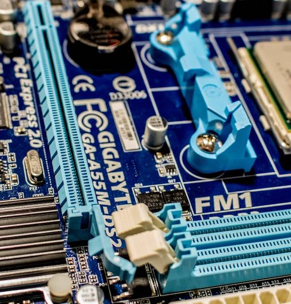 Detailed close-up image of a computer motherboard showcasing various electronic components.