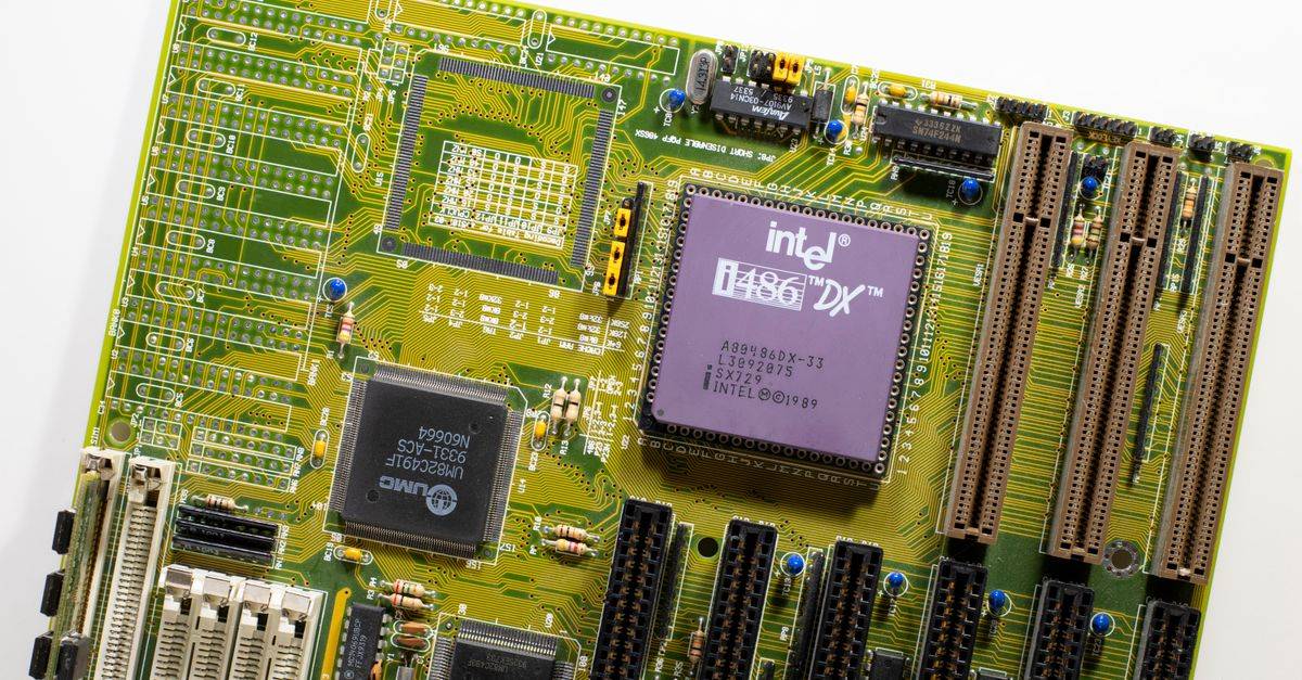 Close-up view of a vintage Intel i486 DX motherboard, highlighting retro technology.