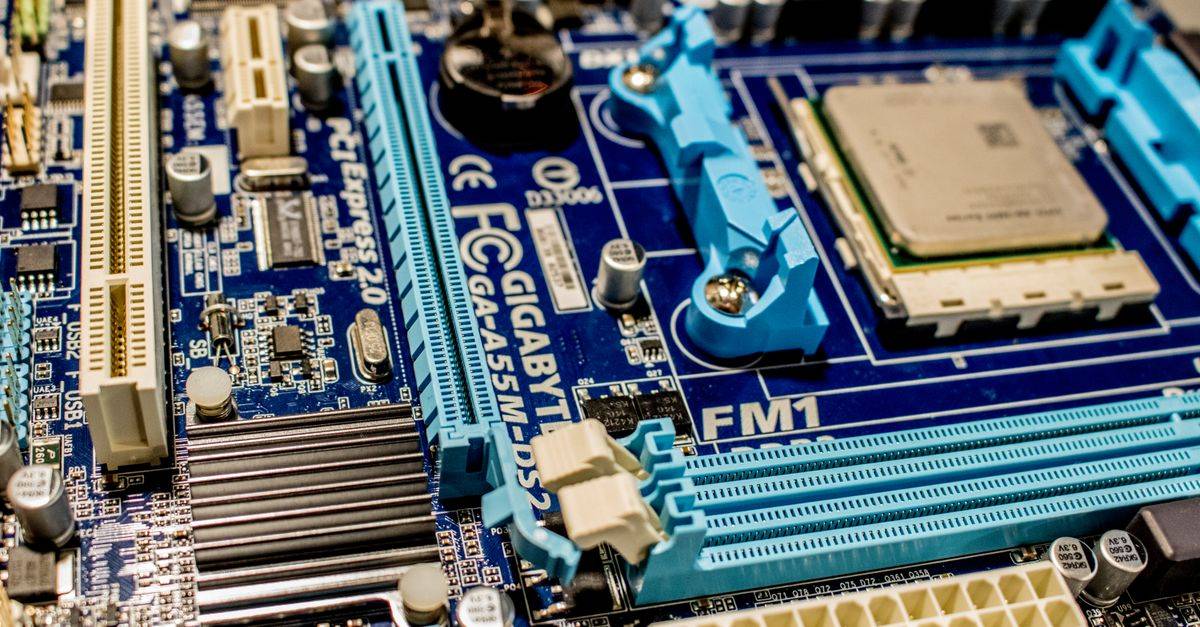 Detailed close-up image of a computer motherboard showcasing various electronic components.