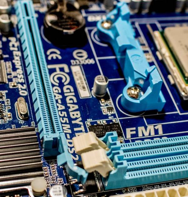 Detailed close-up image of a computer motherboard showcasing various electronic components.