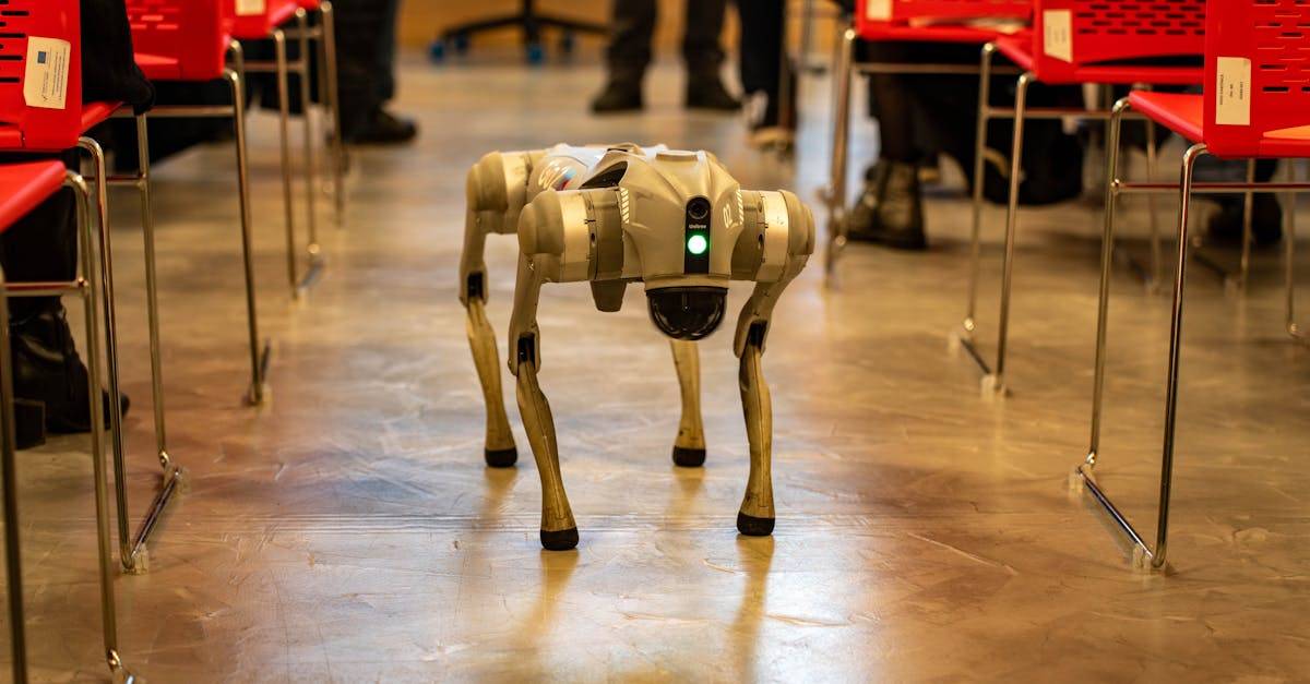 A robotic dog navigates an indoor setting amidst red chairs, showcasing technology in modern environments.