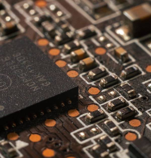 Detailed close-up of a computer circuit board showcasing electronic components.